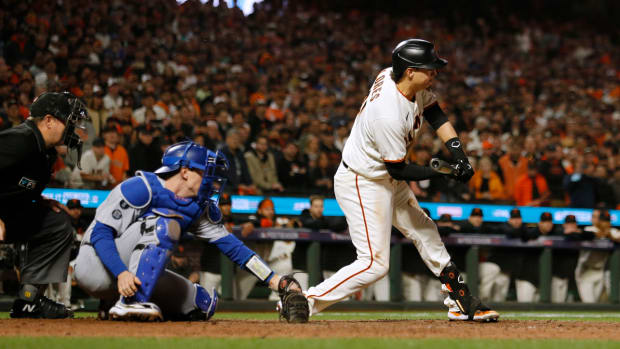 First base umpire Gabe Morales ruled Wilmer Flores swung for strike three to end the game and the Giants' season.